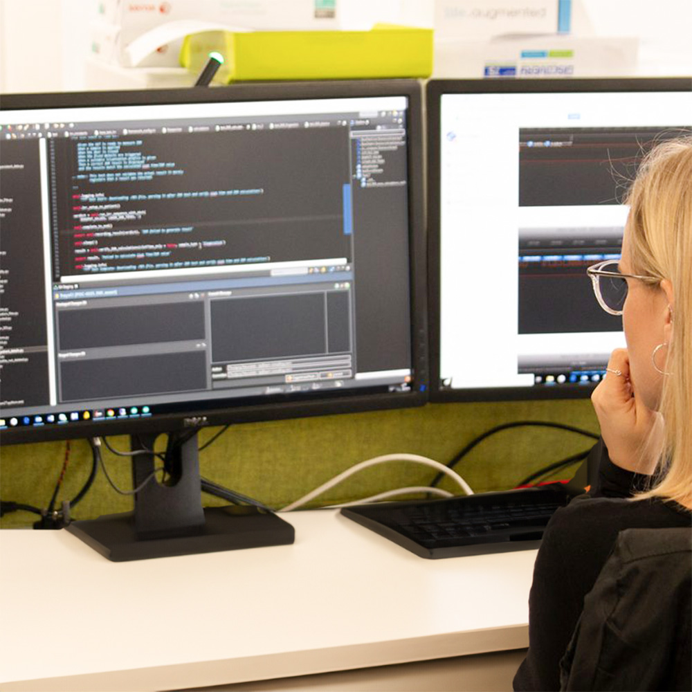 Person looking at code on computer