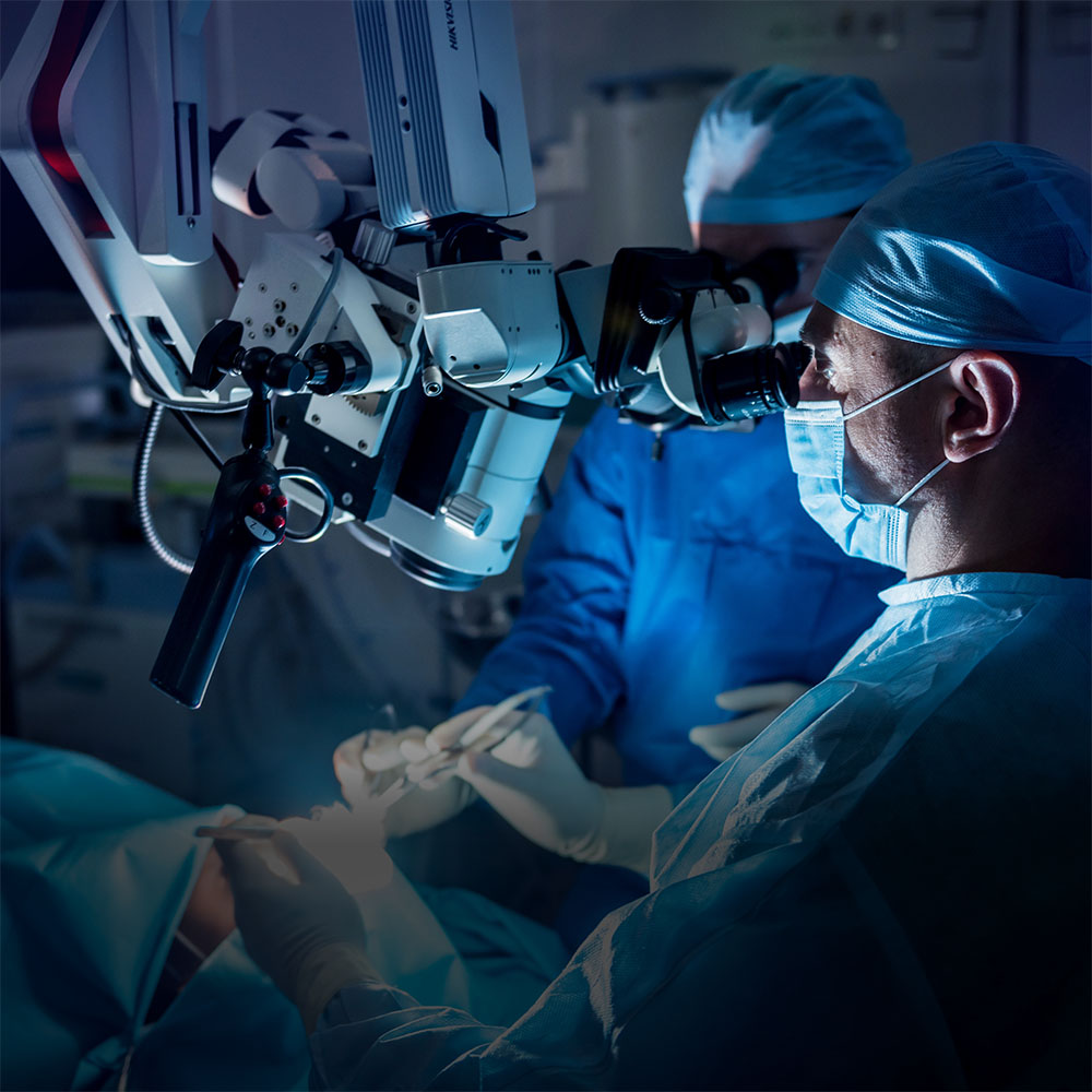 Surgeons performing neurosurgery