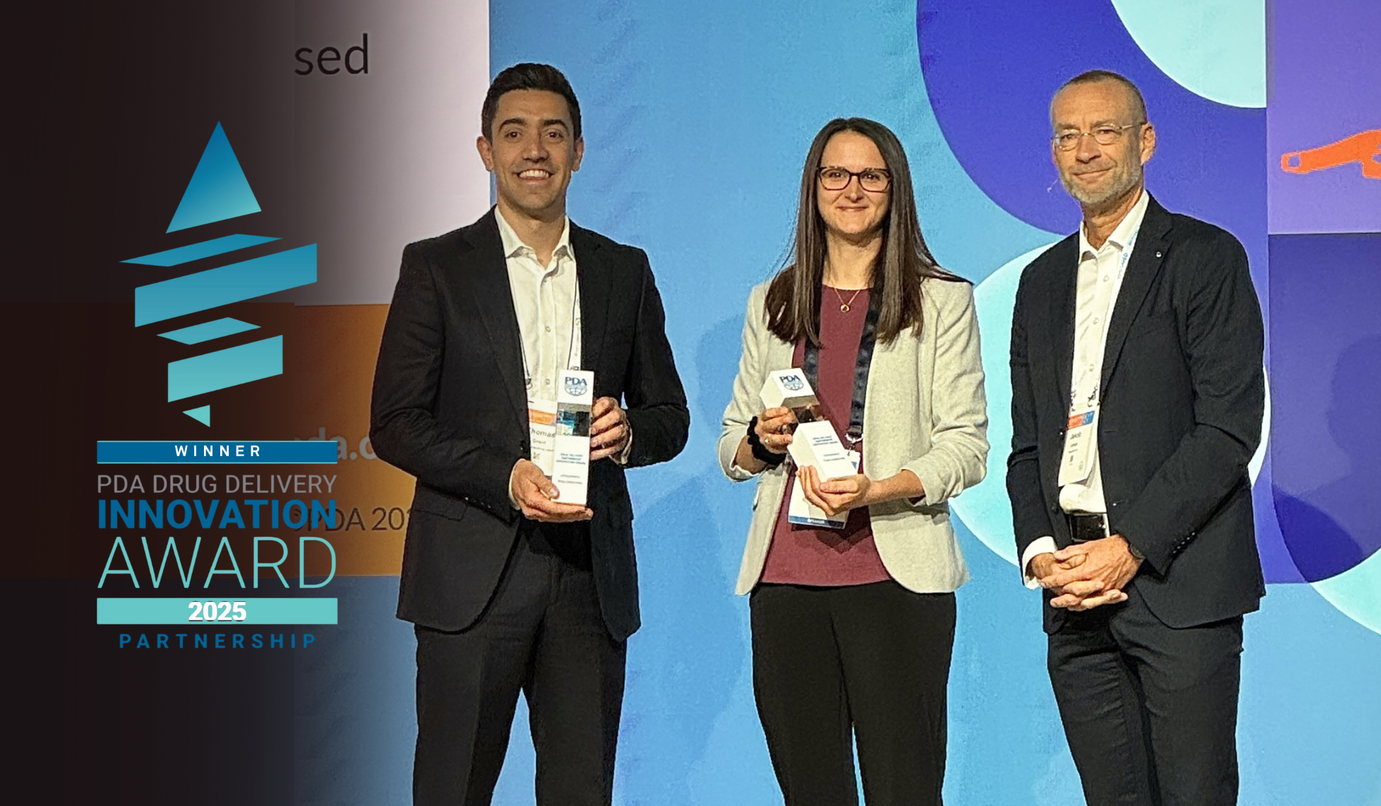 team holding PDA awards at the ceremony, PDA award win 2025 logo 2