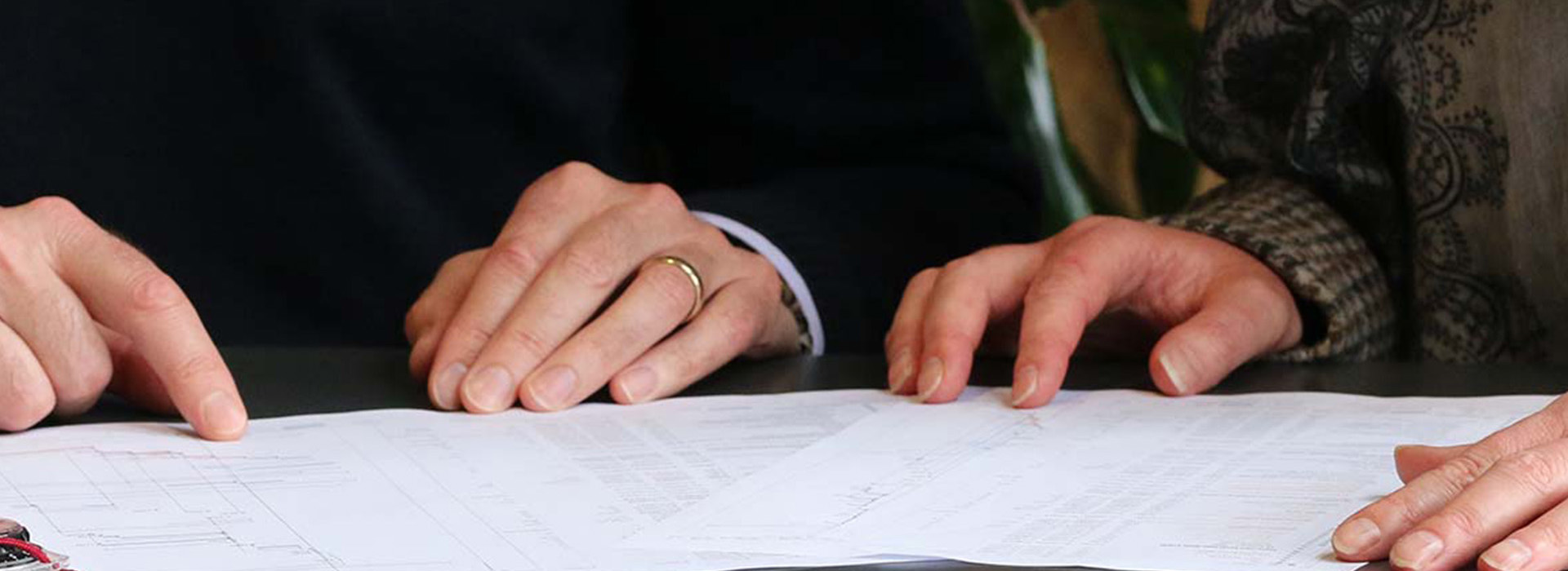 Person pointing at a page